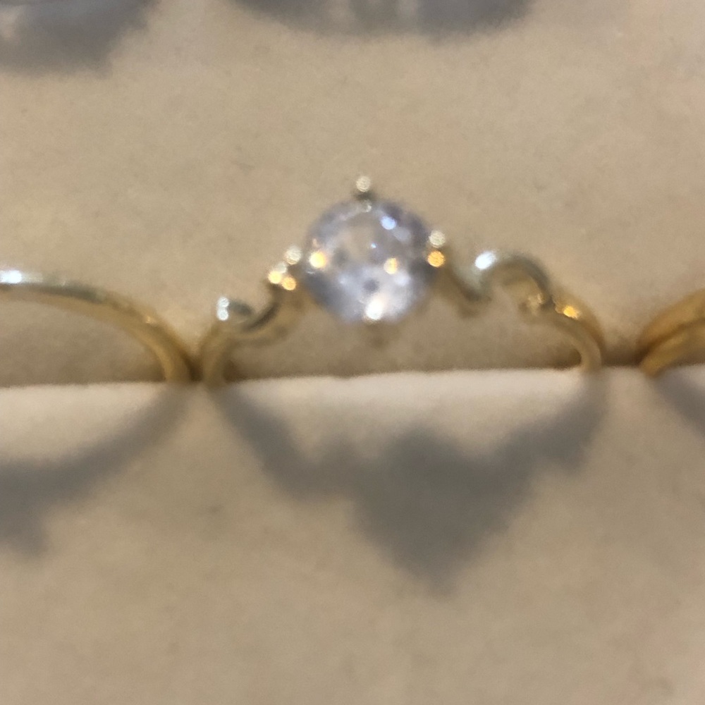 Gold Tone Solitaire Ring with Clear Center Stone